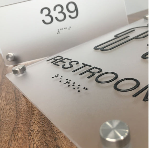 Custom ADA Signs, Frosted Acrylic ADA Signs with tactile lettering and Braille, Wall Offsets for installation